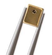 A pair of elegant chopsticks featuring a square-shaped gold tip and silver handles. The design is minimalistic and modern, suitable for upscale dining settings. The gold detailing adds a luxurious touch to the overall aesthetic.