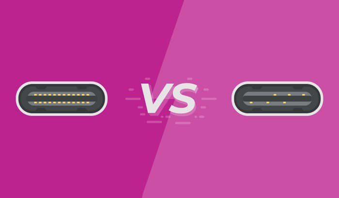 Illustration of two USB-C connectors side by side with a 'VS' text in the center. The image features a vibrant pink background and highlights the design differences between the connectors.