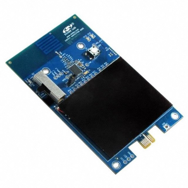 A close-up view of a blue circuit board featuring various electronic components, including a black rectangular module and metallic connectors