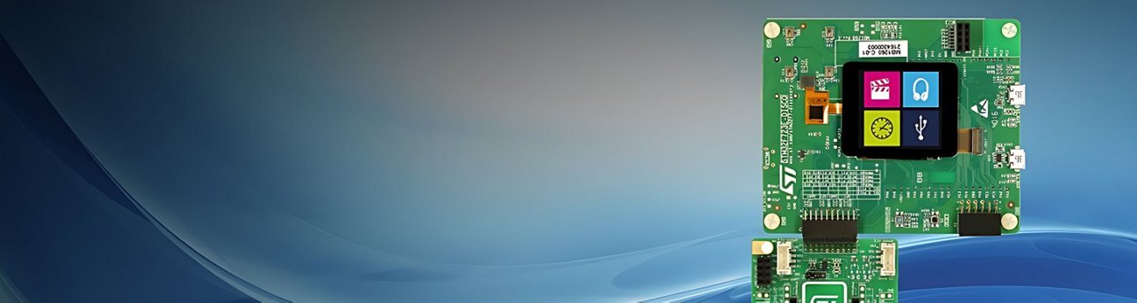 A close-up view of an electronic circuit board featuring a small, colorful display with icons.