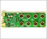 This image shows a green Arrow circuit board featuring six circular connectors and various electronic components.