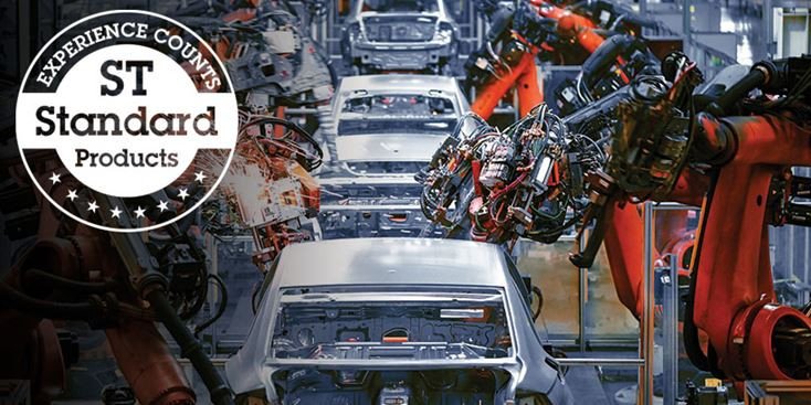 A modern car manufacturing facility featuring an automated assembly line with robotic arms. The image showcases multiple vehicles in various stages of production, emphasizing industrial precision and efficiency.