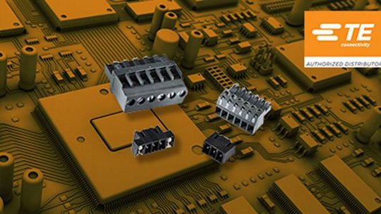 Several dark gray electronic connectors are arranged on a detailed circuit board.