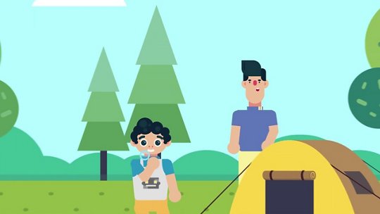 Two children, one blowing bubbles, and another watching, stand near a yellow camping tent in a grassy area with trees.