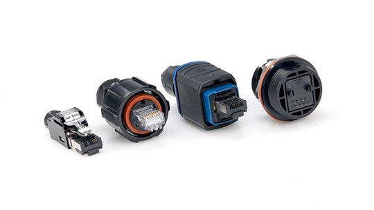 A set of industrial-grade connectors and Ethernet plugs displayed on a white background. 