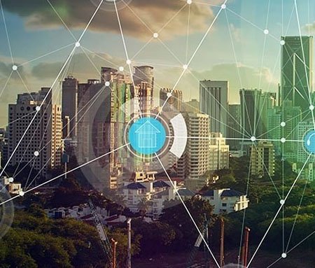 A modern cityscape featuring tall buildings and urban infrastructure, overlaid with digital network graphics symbolizing connectivity.