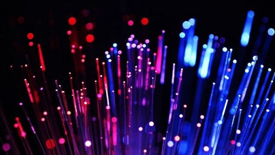 A vibrant display of fiber optic lights in a dark setting