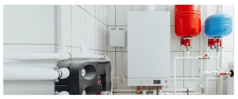 Modern boiler system with red and blue tanks