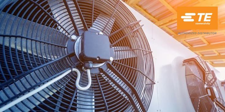 Close-up of industrial cooling fans in a warehouse setting