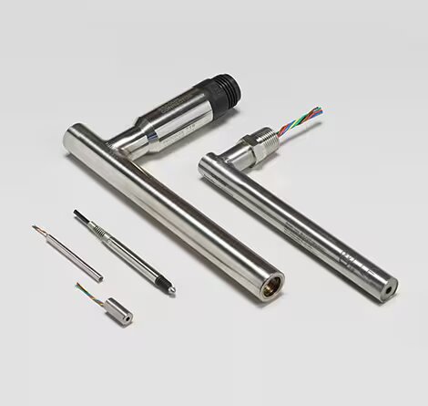 A set of stainless steel cylindrical sensor components is arranged on a light gray background
