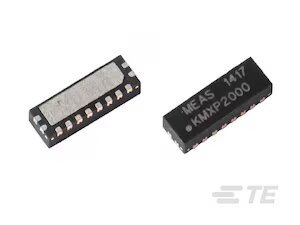 The image shows two small rectangular integrated circuit components labeled MEAS 1417 KMXP2000