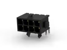 A close-up image of a black rectangular electronic connector featuring eight visible slots. The connector is positioned on a white background, highlighting its metallic pins and structured plastic housing.