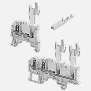Three white modular terminal block components, typically used for electrical wiring and circuit connections.