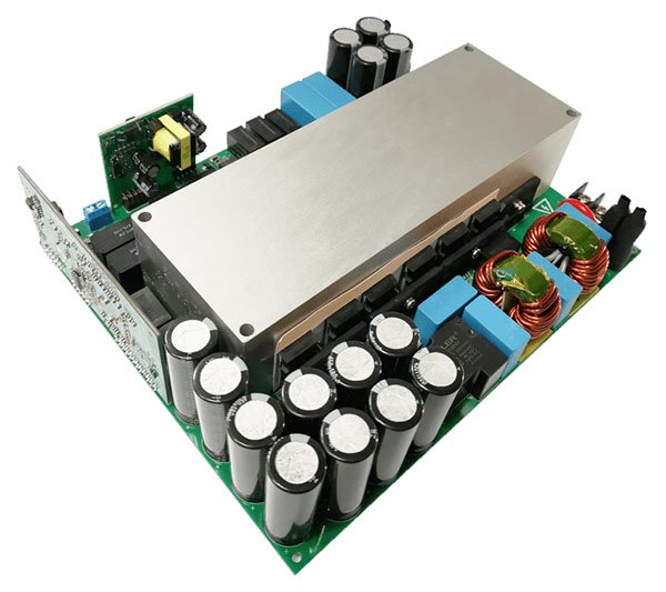 A detailed view of an electronic circuit board featuring multiple capacitors and components.