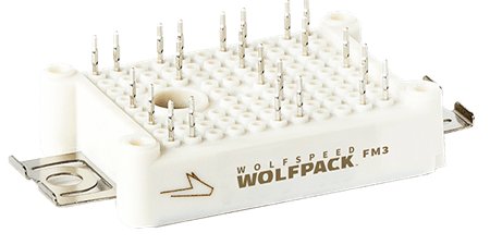 Close-up of a Wolfspeed Wolfpack FM3 power module featuring multiple pins and a compact design