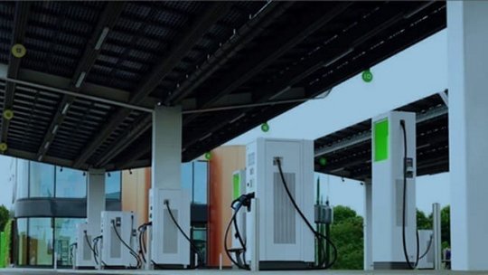 Modern electric vehicle charging station outdoors