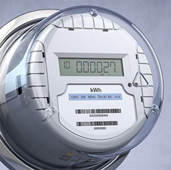 Close-up of a digital electricity meter showing a clear kWh reading of '000027'