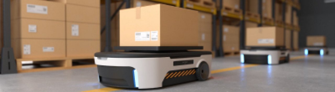 창고에서 상자를 운반하는 자율 로봇의 이미지