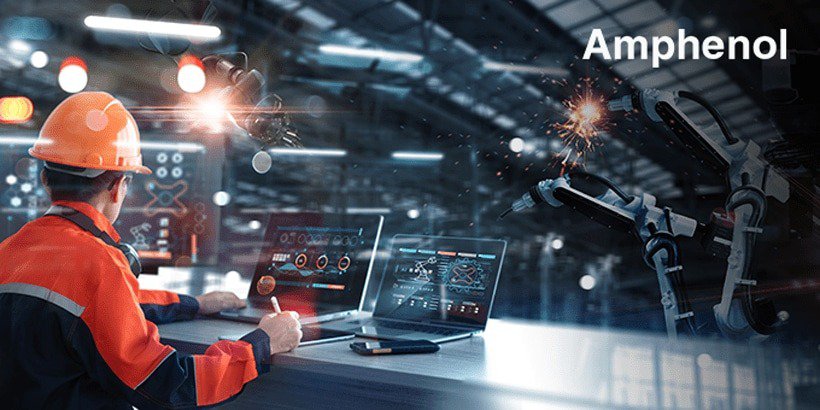 A factory engineer wearing a safety helmet and reflective jacket observes robotic arms performing welding tasks