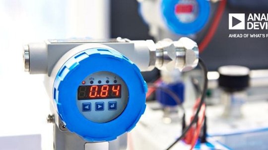 Close-up of an industrial sensor featuring a digital display showing '0.84'