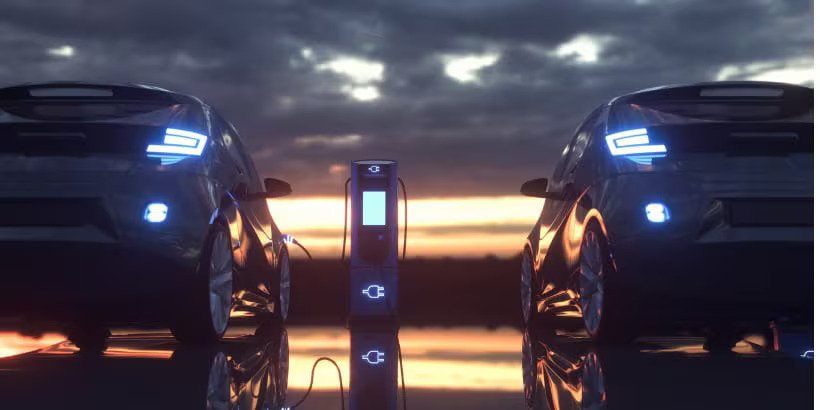 Electric cars charging at a charging station