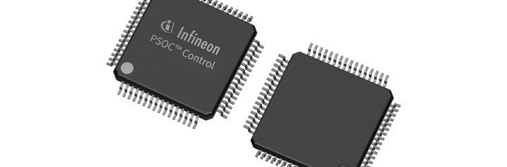Two Infineon PSoC Control microcontroller chips are displayed in a close-up view.