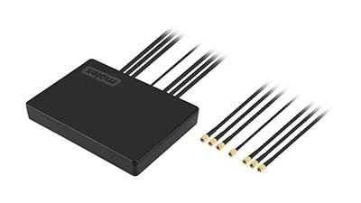 A compact black electronic device featuring six connected cables with gold connectors.