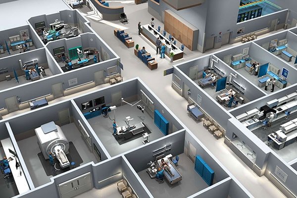 A detailed top-down view of a modern hospital facility showcasing various rooms and medical equipment. The layout includes operating rooms, diagnostic imaging areas, and patient care spaces. Healthcare professionals and staff are visible in the setting, emphasizing a busy and functional environment. The image highlights advanced medical technology and organized infrastructure.