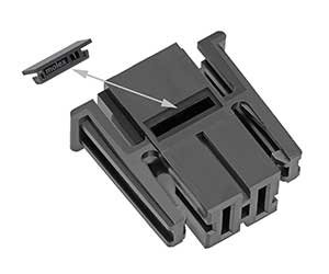 A black plastic connector featuring a removable clip, shown with an arrow indicating its detachment mechanism. The design is angular and functional, suitable for industrial or mechanical applications. The image highlights the connector's modular structure and precise engineering.