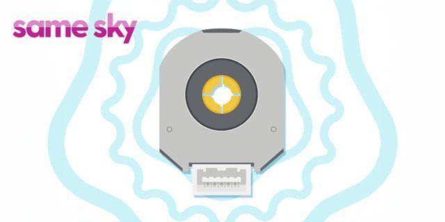 A graphic depiction of a circular device with a central yellow element, surrounded by abstract blue wave-like patterns.