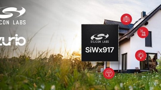Silicon Labs SiWx917 chip prominently displayed with a modern house in the background. The setting features a grassy field at sunset, emphasizing connectivity and smart home technology.