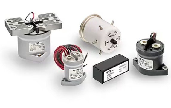 A collection of TE Connectivity electronic components displayed on a white background. 
