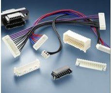 A collection of electrical connectors and wiring displayed on a gradient blue background