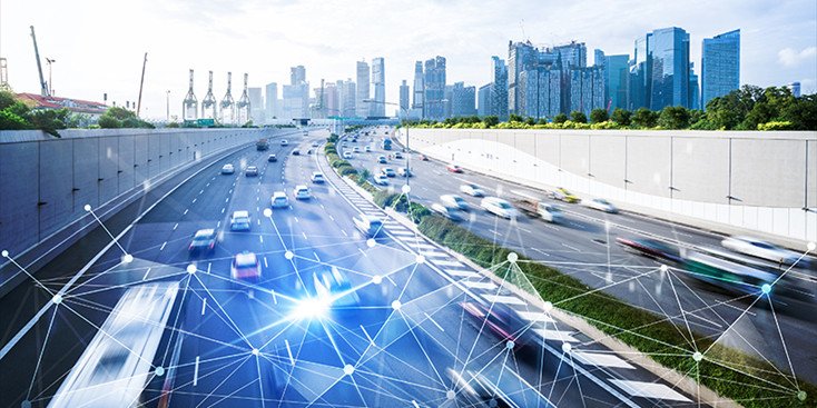 A bustling urban highway with fast-moving vehicles is set against a modern city skyline. 