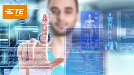 A person interacts with a high-tech digital interface featuring holographic visuals. 