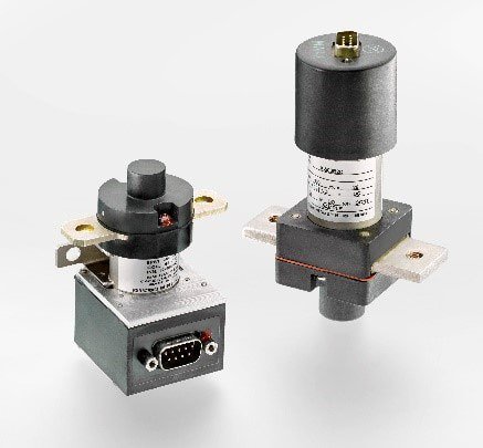 Two industrial solenoid valves are displayed against a neutral white background