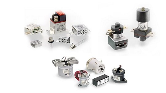 A collection of electrical relays and components displayed on a white background