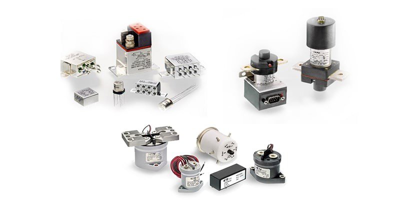 A collection of electrical relays and components displayed on a white background