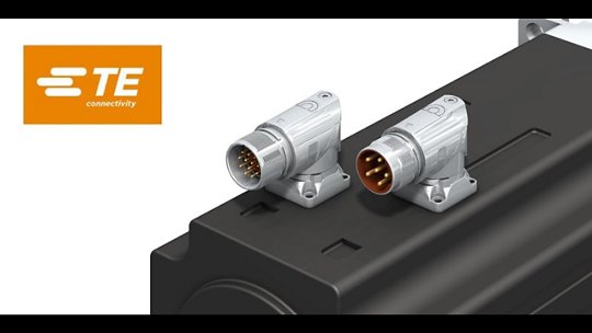 Two TE Connectivity industrial connectors are mounted on a black mechanical component, showcasing their robust design and metallic finish. 