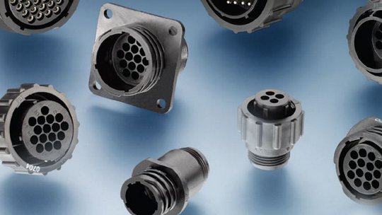 A collection of industrial connectors featuring circular multi-pin designs, displayed on a gradient blue background.