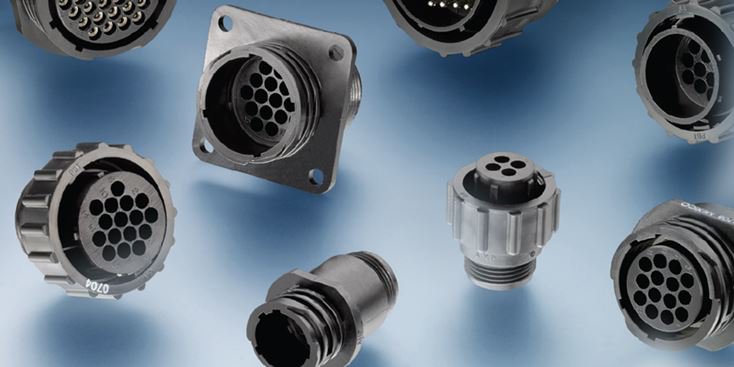 A collection of industrial connectors featuring circular multi-pin designs, displayed on a gradient blue background.