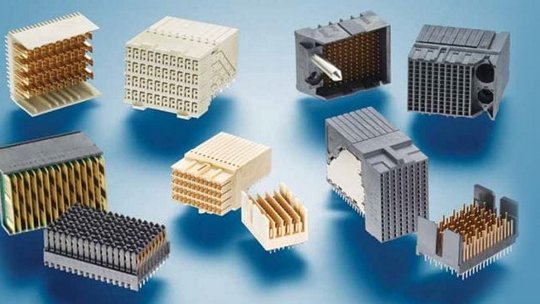 Various electronic connectors on blue background