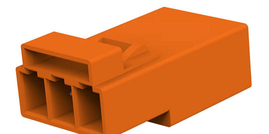A close-up view of an orange electrical connector featuring three distinct slots.