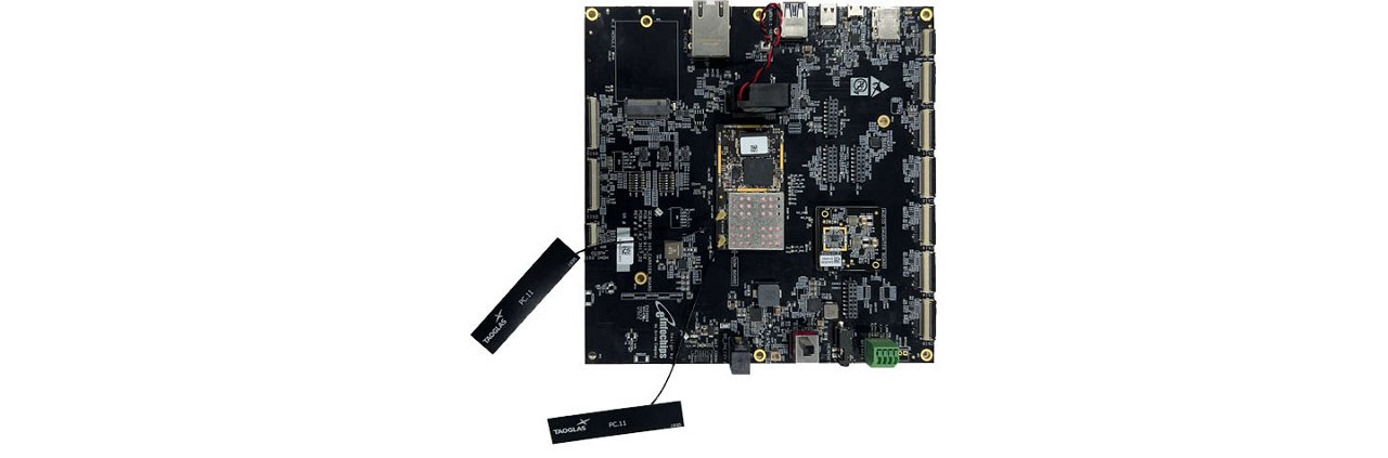 A detailed view of an electronic circuit board featuring various components, connectors, and chips. 