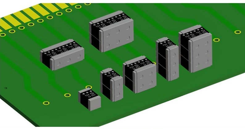 A close-up view of electronic components mounted on a green circuit board